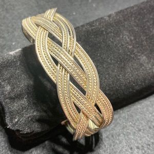 This piece is gorgeous. It is a sterling silver weed bracelet bangle 31.7